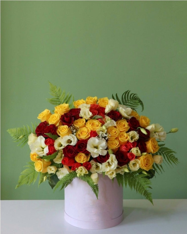 "Sunny Spectacle: A Tapestry of Roses and Ranunculus"